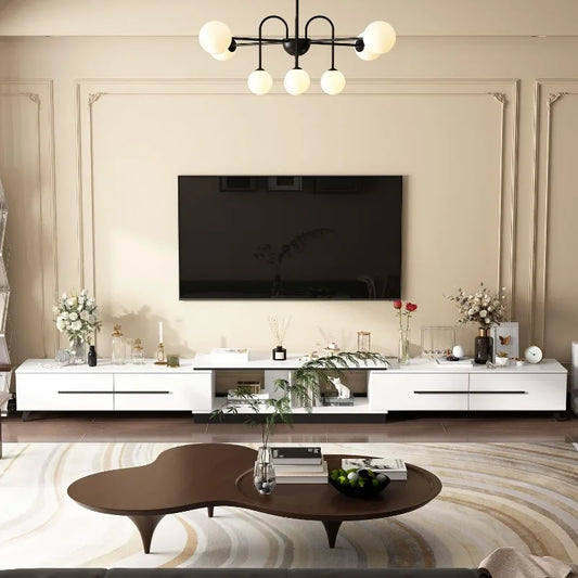 Extendable low rise entertainment Center go from 95" to 134" in seconds. Beautiful gold accents give it an elegant touch!