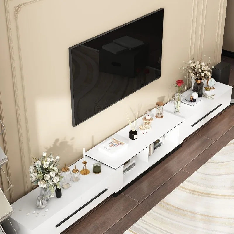 Extendable low rise entertainment Center go from 95" to 134" in seconds. Beautiful gold accents give it an elegant touch!